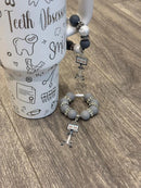 Itero Stanley Tooth Charms