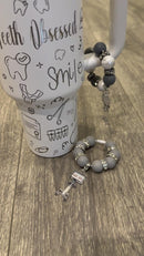 Itero Stanley Tooth Charms